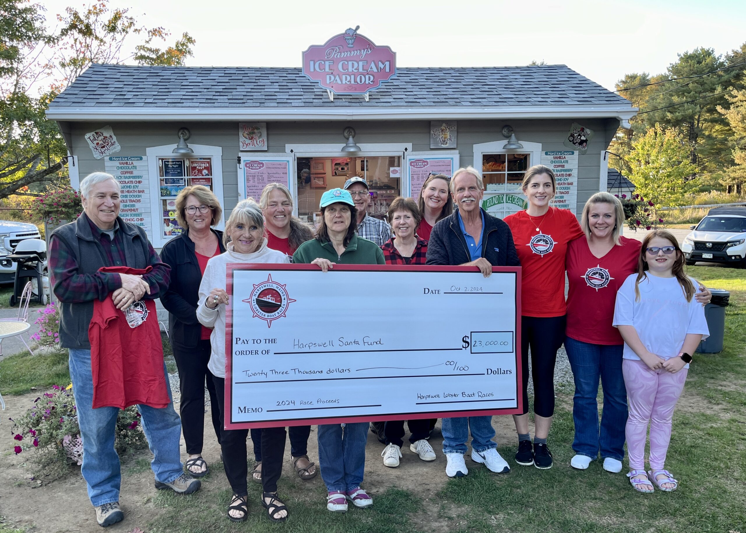 2024 Harpswell Lobster Boat Race Committee Check Donation Presentation to The Harpswell Santa Fund